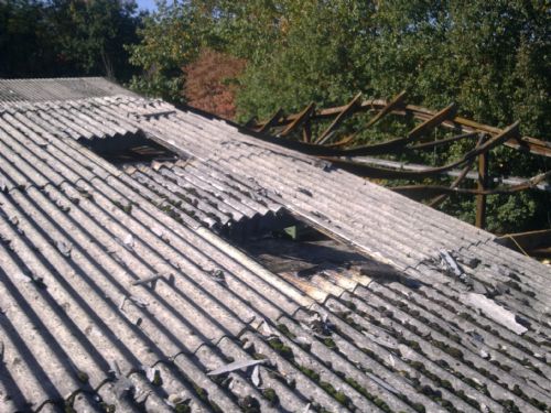 Removal Of Fire Damaged Roof Sheets At Advanced Minibus, Chesterfield - Asbestos Removal Companies Chesterfield