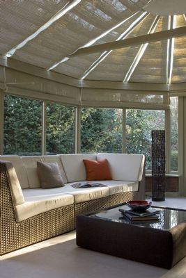 Triangular Woven Wood blinds to ceiling of wooden conservatory
