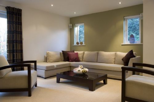 TV room with Interlined curtains to modern pole and blackout blinds recess