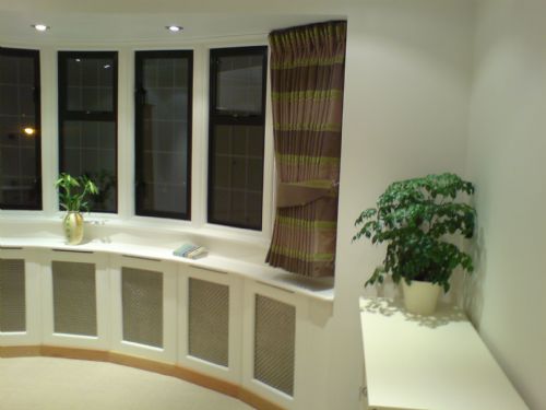 Interlined Casamance curtains to a Silent Gliss Track (multi angle  bay)