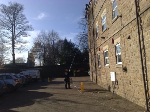 High level ladderless  water fed pole window cleaning. - Window Cleaners Dewsbury