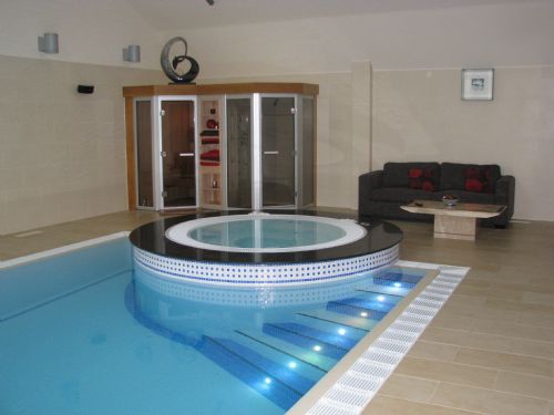Indoor deck level swimming pool installation. - Swimming Pool Construction Companies Warrington