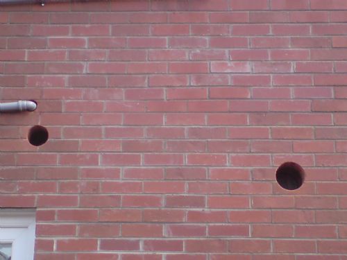 Holes for plumbers pipe neat and clean cut. - Drilling Companies Belfast