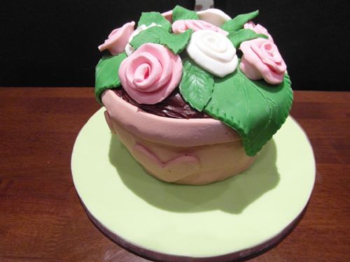 Mother's day cake- Chocolate sponge and chocolate fudge frosting, decorated with fondant icing - Occasion Cake Makers Chessington