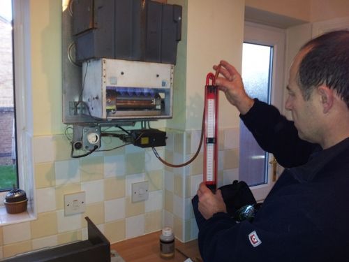 Servicing and testing a boiler. - Gas Fitters Bristol