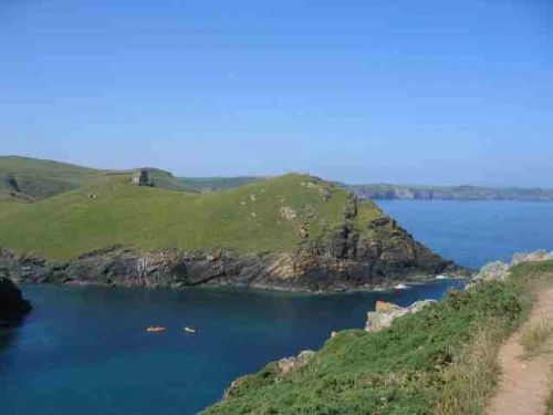 Port Quin kayaking on a sunny day - Activity Holidays Companies Port Isaac