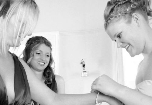 Greecian style pin up bride with half up/downs for bridesmaids. - Mobile Hairdressers Wakefield