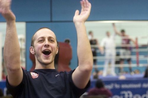 boxing fan applaudes his teams win at the British University    freelance pr jobs yorkshire