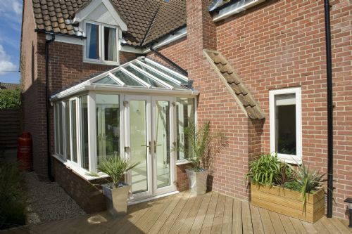 Cream Painted uPVC conservatory - Blue Tint Glass Roof