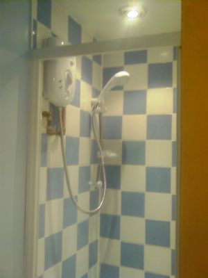 A Wardrobe conversion to Shower Suite in a Master's Bedrm. at Woolwich, London