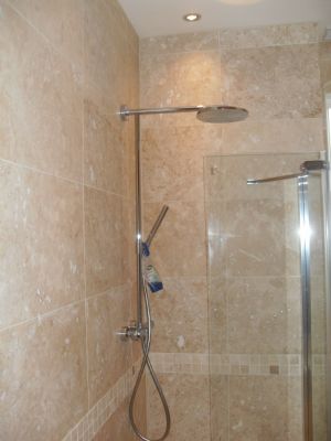 Natural travertine stone, Hansgrohe shower.....Perfect