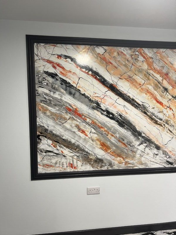 Handcrafted Venetian plaster panel with artistic marble look.