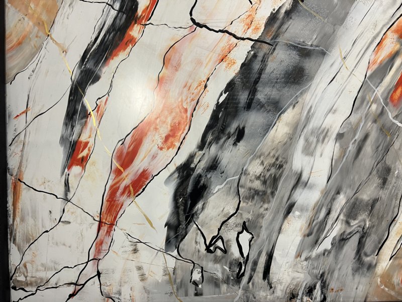 Luxury Venetian plaster feature wall with artistic marble effect.