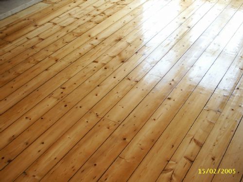 AFTER picture of the same domestic pine floor