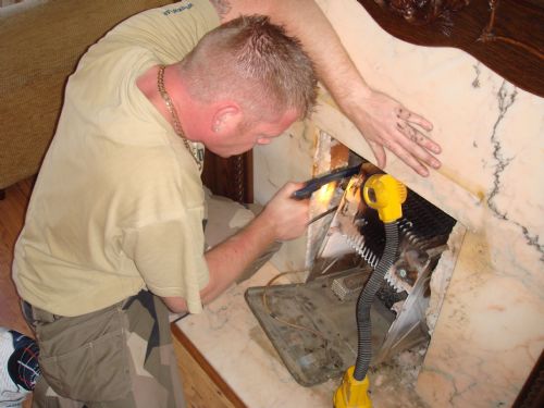 De-commissioning a old fire back boiler.