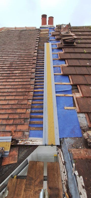 Bonding Gutter Repairs on Party Wall.