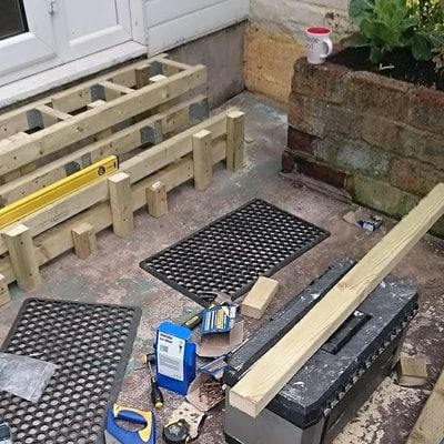 Construction of steps from patio doors into the garden.