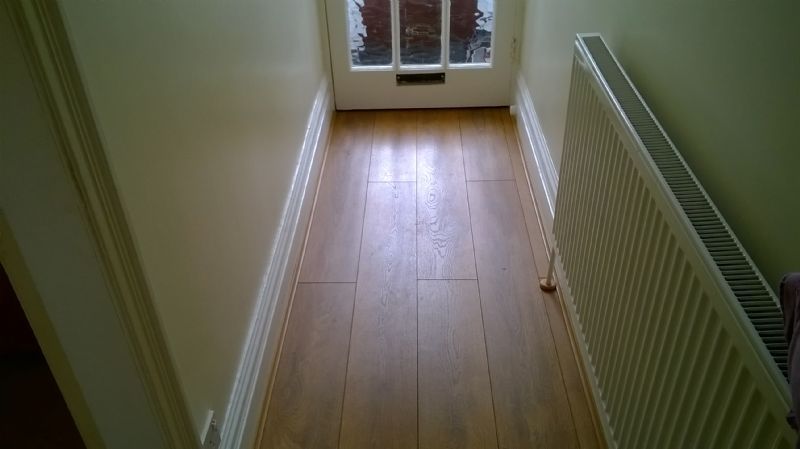 Quality laminate flooring fitted to a entrance hall