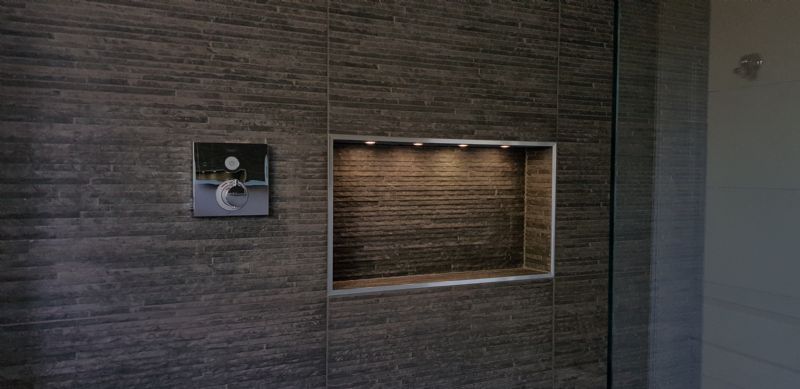 Concealed shower valve and inset niche with LED lighting