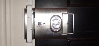 Banham High Securiy Lock With London Bar Reenforcing Strip Over Keep