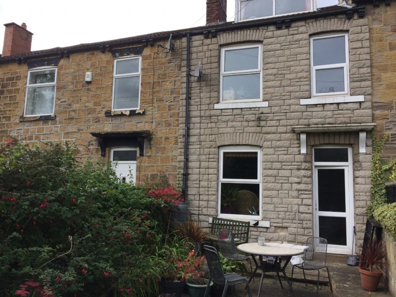 A late victorian stone terrace house with stone cladding on Leeds area
