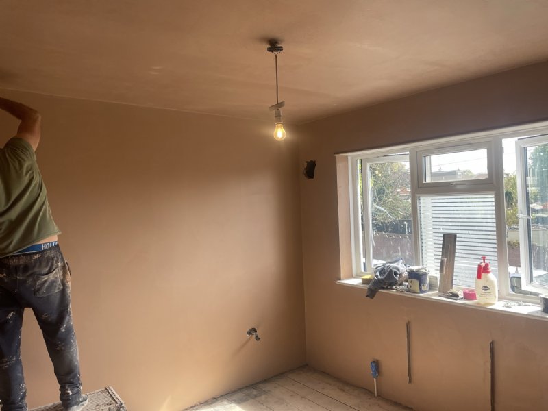 Plastering.