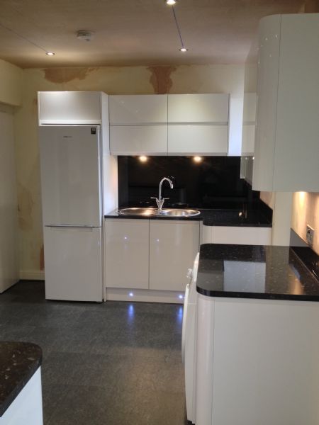 Planar Gloss White, Black toughend glass splashbacks & upstands