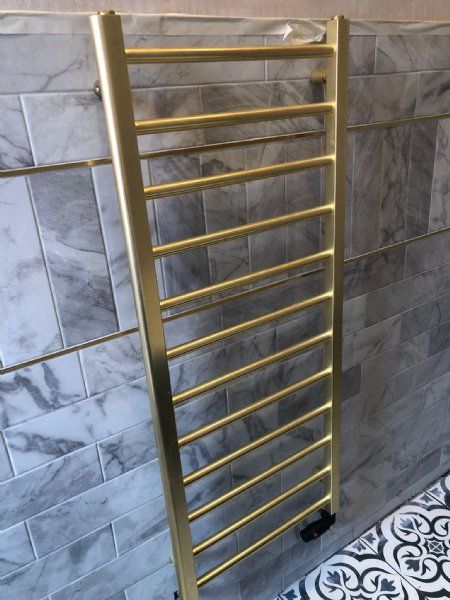 Beautiful gold towel radiator.