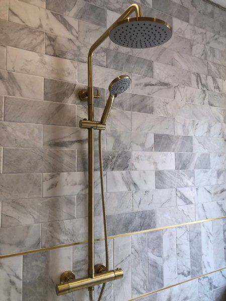 Gold mixer bar shower.