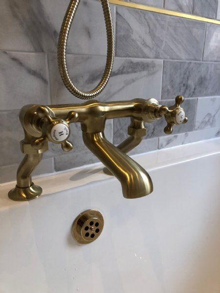 Gold mixer bath tap.