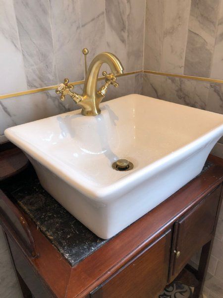 Gold basin mixer tap.