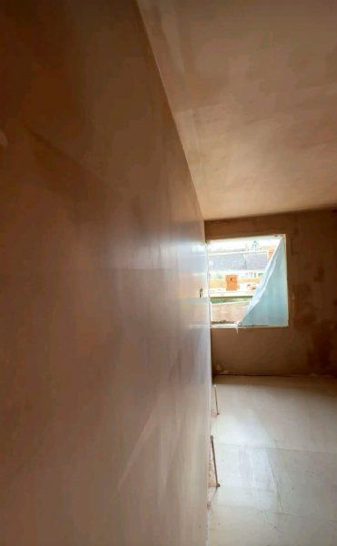 Plastering.
