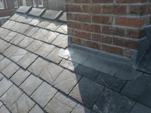 Code 4 lead apron, flashings and slating in Lymm by HQ Roofers in Manchester
